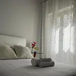 Sr
